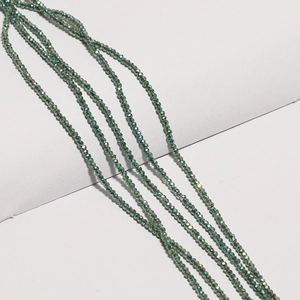 Macro shot of deep green faceted crystal beads for DIY jewelry and necklace making