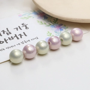 Perle in resina rosa e verde pastello con lucentezza oleosa per gioielli fai-da-te