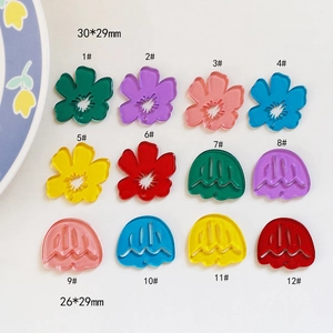 Detailed view of acrylic tulip pendants in vibrant colors for DIY jewelry and earrings
