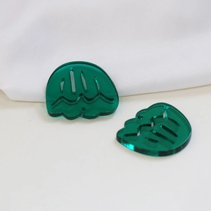 Detailed view of semi-circular green acrylic charms with wavy hand-painted tulip textures