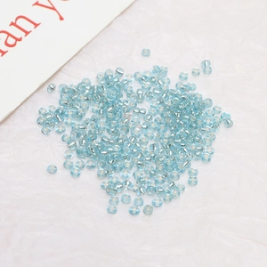 Close-up of 2mm light blue silver-lined glass seed beads for DIY jewelry making