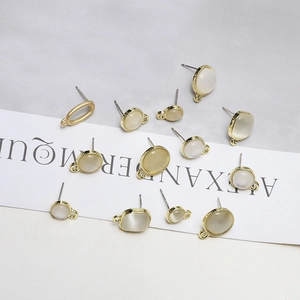 925 silver stud earring parts with gold metal base and translucent cat eye stones