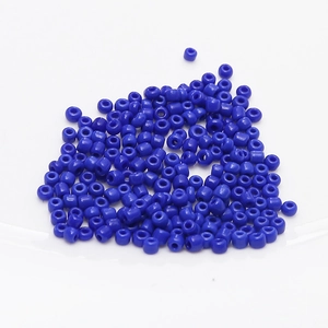 Close-up of 2mm dark blue ceramic seed beads for DIY jewelry and handicraft making
