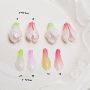 Macro detail of gradient resin petal pendants for DIY jewelry making with dimensions