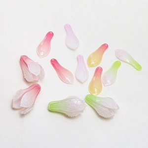 Macro shot of gradient UV resin magnolia petals for DIY floral jewelry making