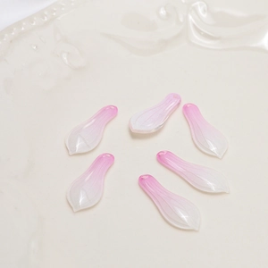Macro shot of 6 gradient pink resin flower petals for DIY jewelry making and earrings