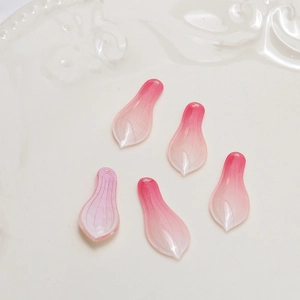 Macro detail of five gradient pink resin flower petals for DIY jewelry accessories