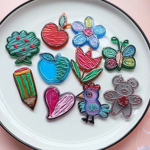 Set of 10 hand-drawn style acrylic charms featuring apple, butterfly, and bird designs
