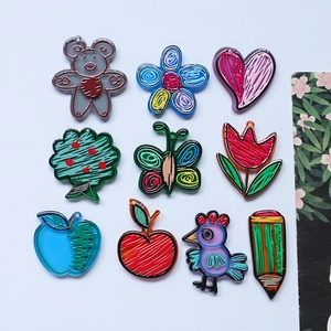 Colorful hand-drawn acrylic charms set featuring bear, flower, and pencil shapes