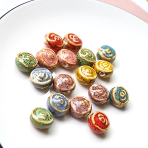 Detail of colorful ceramic rose beads with crackle glaze finish for jewelry making