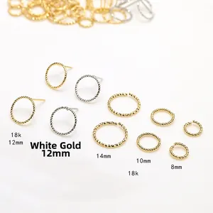 Detail view of twisted gold and silver round earrings in sizes 8mm to 14mm
