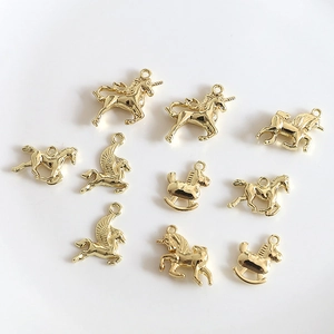Golden alloy unicorn and pegasus charm pendants for DIY handmade jewelry crafting