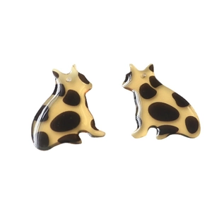 Cute leopard print cat shaped resin earrings featuring a sleek polished finish on white backdrop
