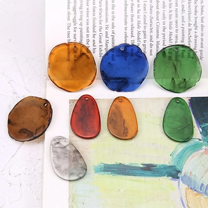DIY translucent tortoiseshell resin pendants for handmade jewelry in various shapes and colors