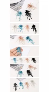 Macro detail of handmade crystal bead floral pendants for DIY jewelry and hair accessories