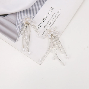 Exquisite white crystal bead floral tassel earrings with long dangling chain details