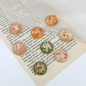 Vintage round resin charms with botanical inserts and gold alloy frames for DIY jewelry making