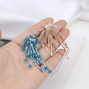 Handmade beaded flower fringe earrings in blue and gold pink with faceted crystal beads