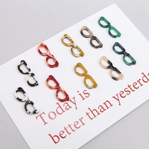 DIY acetate resin eyeglass-shaped pendants in marble and tortoiseshell patterns