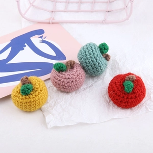 Handmade crochet mini apples for DIY jewelry and bag accessories in four vibrant colors