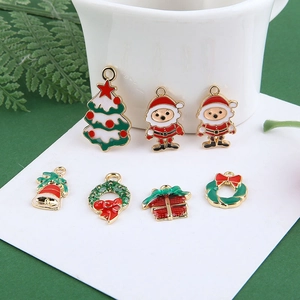 DIY Christmas charms set with Santa, bell, and tree for holiday jewelry making
