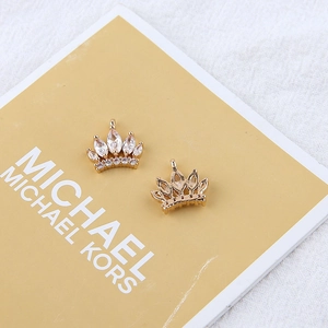 Detail view of crown charms in gold plating with cubic zirconia for DIY jewelry