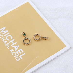 Detail of 18K gold plated hoop pendants with green zircon stones for DIY jewelry making