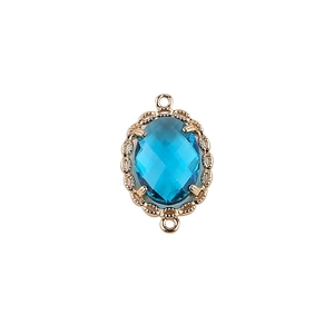Blue oval crystal connector pendant in gold braided metal frame for jewelry making
