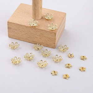 Golden filigree bead caps and star metal spacers for DIY jewelry making and earring pendants