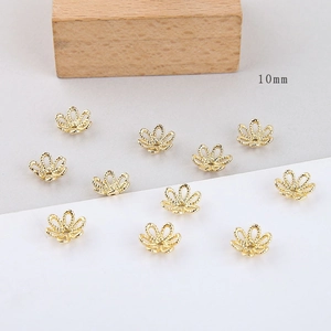 Detailed view of 10mm gold plated hollow flower bead caps for DIY jewelry making