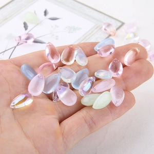 Close-up of teardrop glass beads in various colors for DIY handmade jewelry crafting
