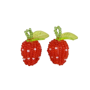 Handmade strawberry beaded pendant with red crystal beads and green leaf accents