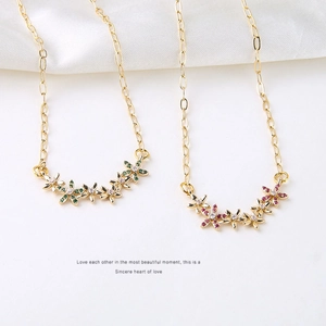 Gold-plated floral cluster necklace with colorful zirconia on paperclip chain