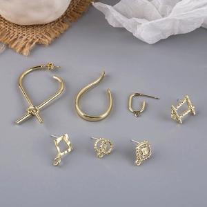 Detailed set of gold plated DIY jewelry charms with clear zircon inlay and ear hooks