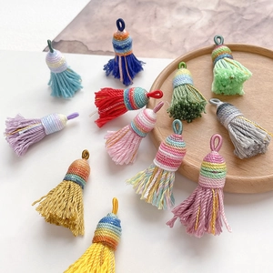 Handmade woven tassel charms in various colors for DIY crafts and bag accessories
