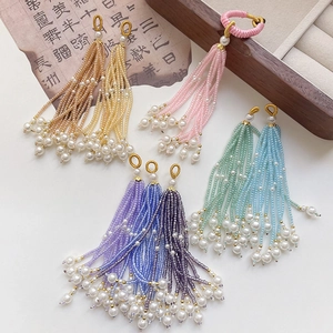 Handmade Chinese tassel pendant with beads and faux pearls in various vibrant colors