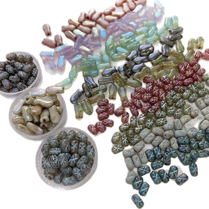 Colorful Czech glass fish and geometric beads for DIY handmade jewelry crafting