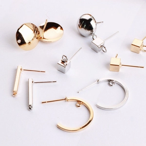 DIY jewelry earring components with geometric shapes in gold and silver metal finishes
