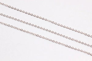 Macro view of silver-plated metal O-chains for DIY jewelry making and earring accessories