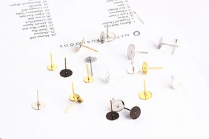 Flat base stud earring findings in gold, silver, black, and bronze for DIY jewelry making