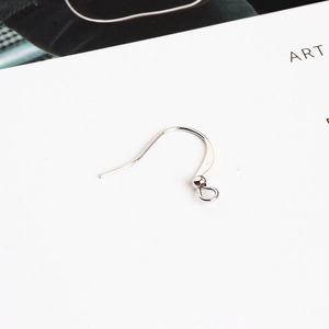 Close-up of S925 sterling silver earring hooks with metal beads and open loop connectors