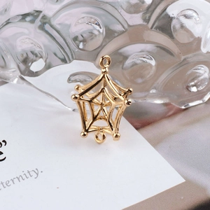 Detailed view of 18K gold-plated hollow geometric spiderweb pendant for DIY jewelry design