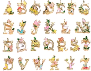 Detailed set of 26 enamel flower alphabet charms for DIY jewelry making with gold base