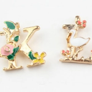 Floral enamel alphabet K and L pendants in gold finish for DIY jewelry making