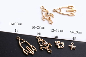 Gold-plated rocket and star alloy charms with rhinestones for DIY jewelry making