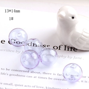 Macro shot of 13x14mm light purple transparent hollow glass beads for DIY jewelry making