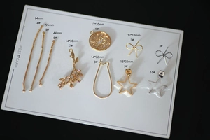 Detailed assortment of gold and silver plated DIY jewelry components with precise measurements