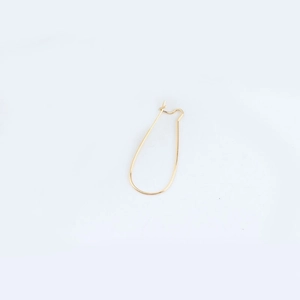 Detailed view of teardrop shaped gold plated earring hooks for DIY jewelry crafting