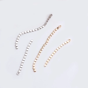 Close-up of 18K gold plated flat bead chains for DIY earring and jewelry making