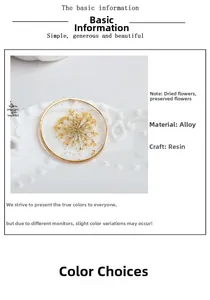 Detailed view of handmade resin pendant with yellow dried flowers and gold leaf foil